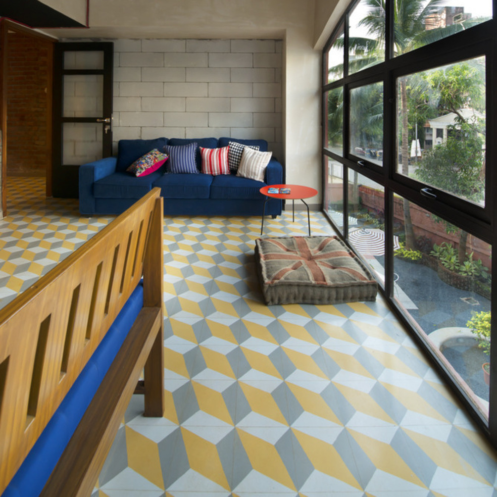 Room with patterned flooring.
