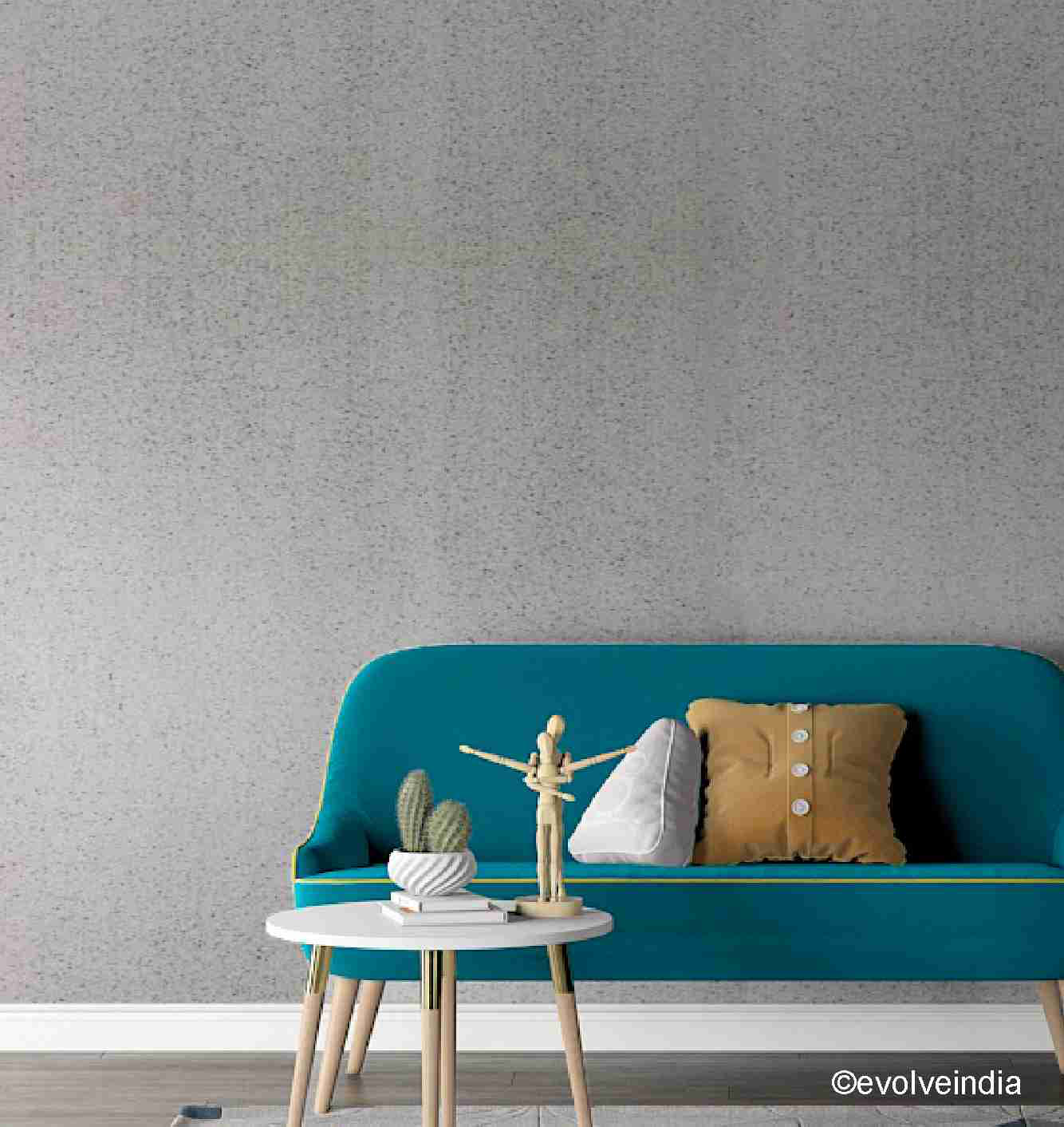 Grey concrete wall with a teal sofa in front
